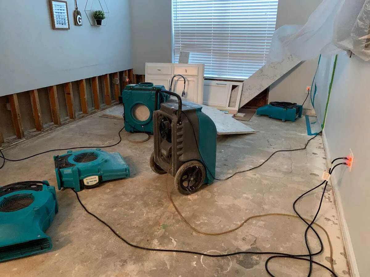 Dehumidifier in flood-cut room for Water Damage Restoration in Ashwaubenon